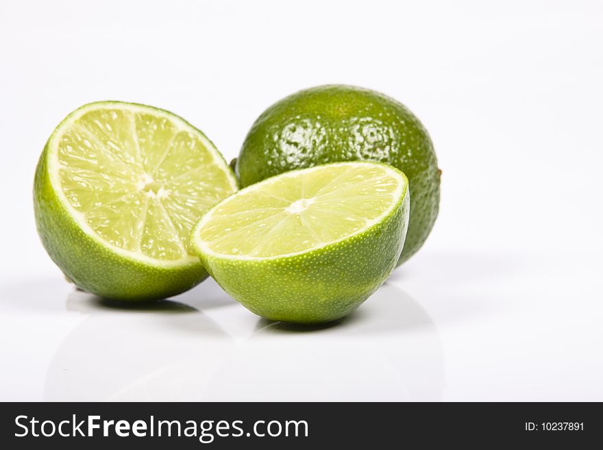 Fresh lime on the white background.