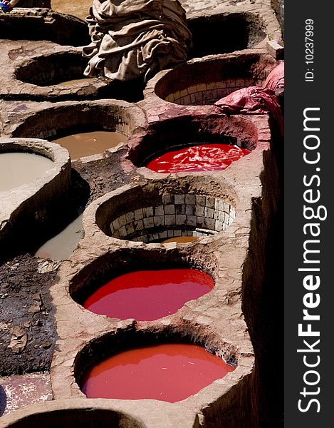 A tannery in Morocco exposing leather been dyed. A tannery in Morocco exposing leather been dyed