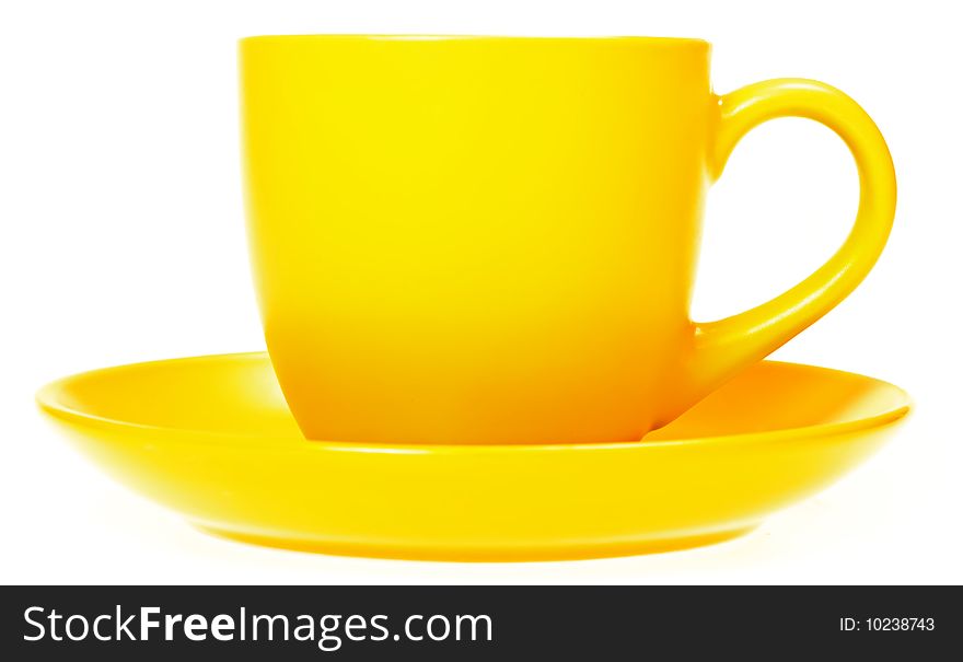 Yellow cup on white background
