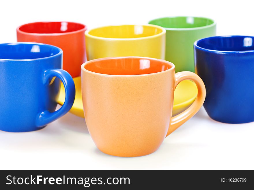 Color cups isolated on white.