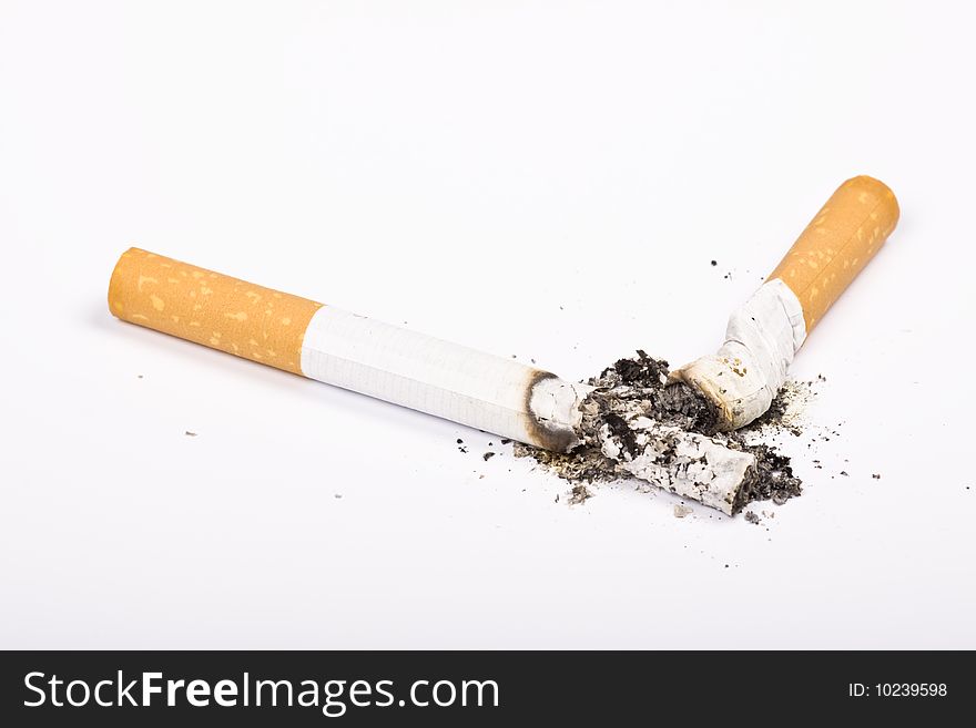 Cigarette on white background - isolated, smoking concept. Cigarette on white background - isolated, smoking concept