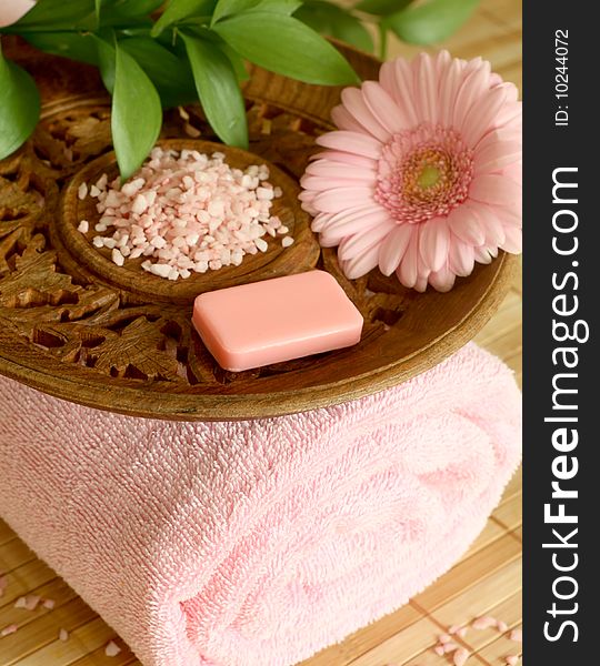 Spa concept. Towel, soap, bath salt and gerber.