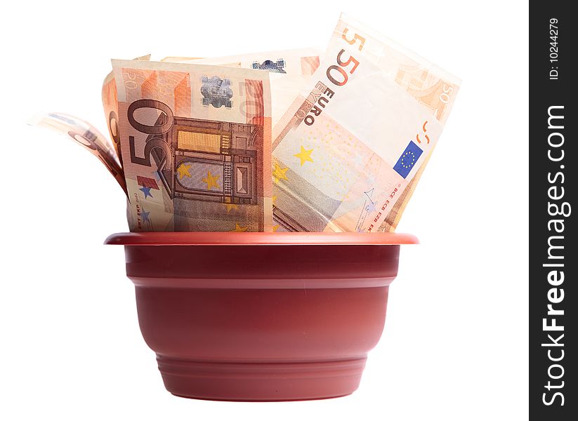 A photo of euro in pot  on white background. A photo of euro in pot  on white background