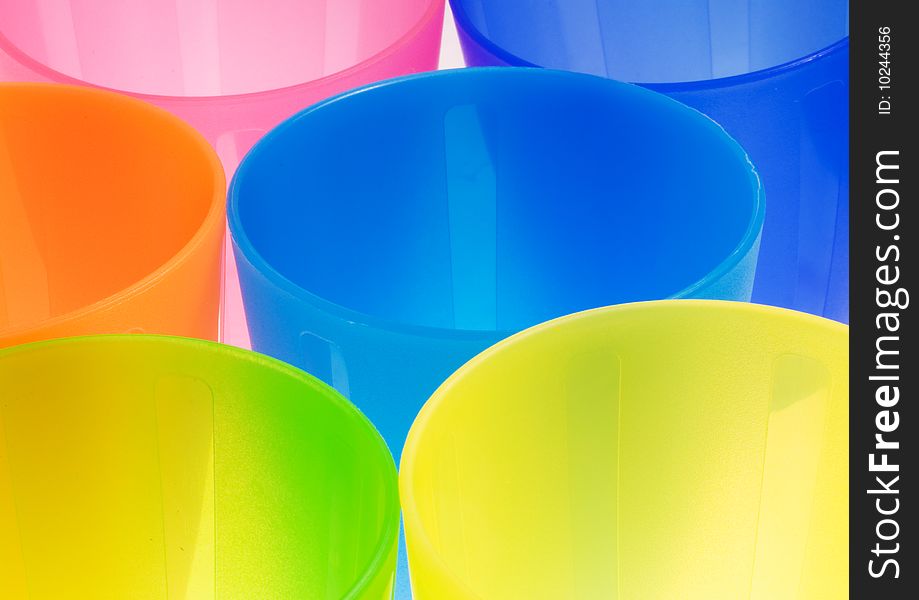 Detail of an array of colored, empty, plastic cups. Detail of an array of colored, empty, plastic cups.