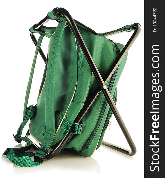 Set for a picnic in a green backpack