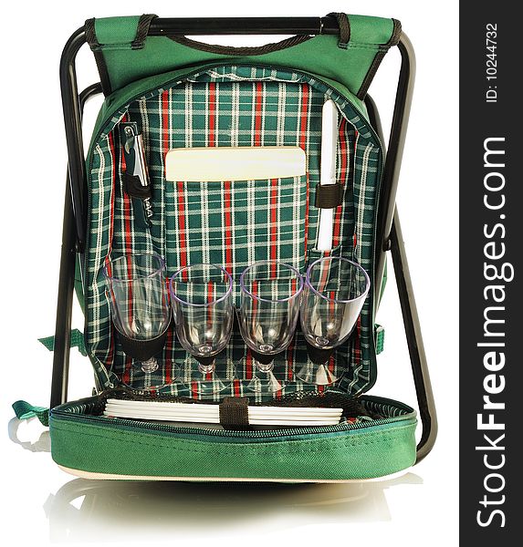 Set for a picnic in a green backpack