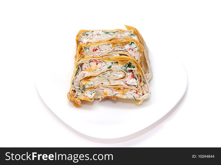 Rolls filled with eggs, crabmeat and vegetables in lavash. Rolls filled with eggs, crabmeat and vegetables in lavash