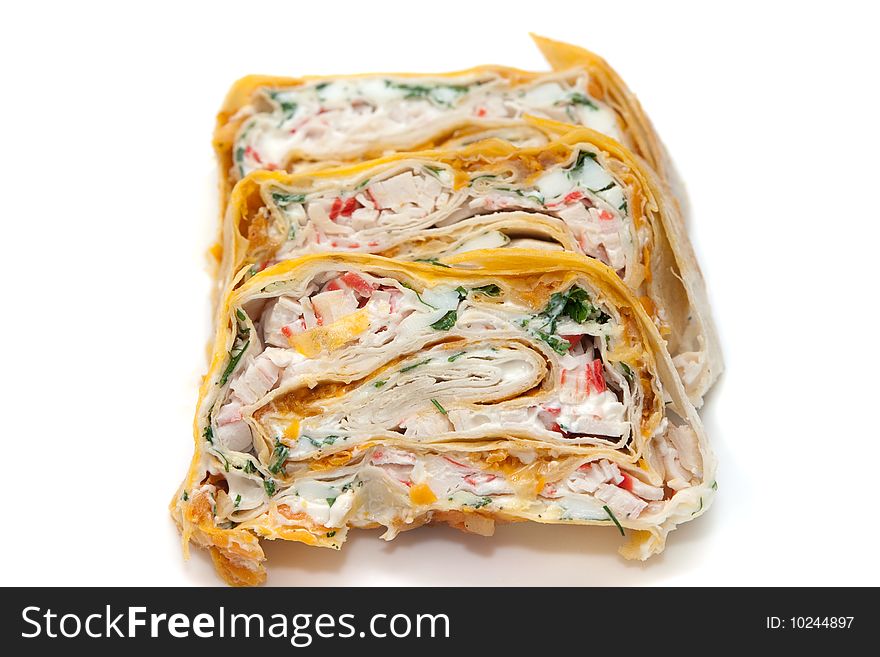 Rolls filled with eggs, crabmeat and vegetables in lavash. Rolls filled with eggs, crabmeat and vegetables in lavash