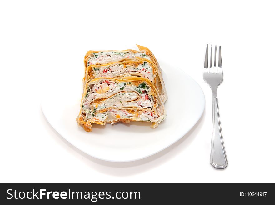 Rolls filled with eggs, crabmeat and vegetables in lavash. Rolls filled with eggs, crabmeat and vegetables in lavash