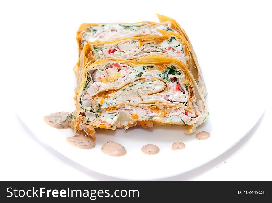 Rolls filled with eggs, crabmeat and vegetables in lavash. Rolls filled with eggs, crabmeat and vegetables in lavash