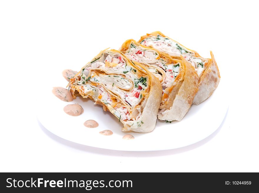 Rolls filled with eggs, crabmeat and vegetables in lavash. Rolls filled with eggs, crabmeat and vegetables in lavash