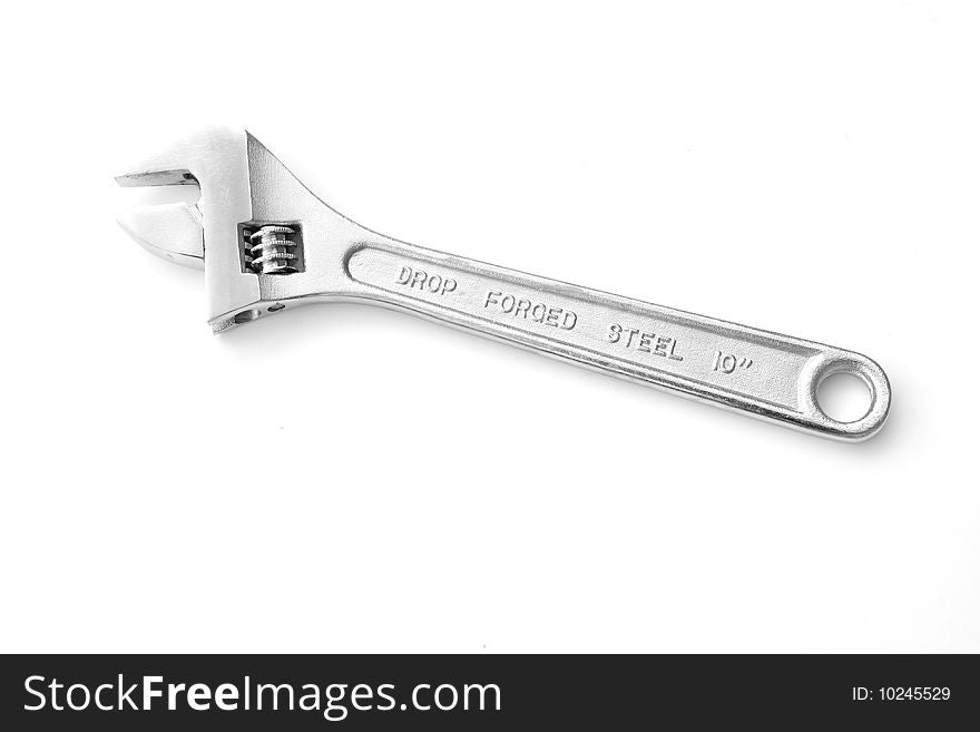 Side view of an adjustable wrench isolated on white. Side view of an adjustable wrench isolated on white