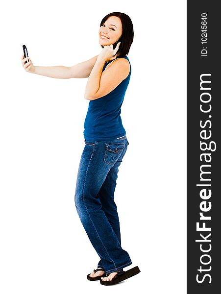 Happy woman talking on a mobile phone isolated over white. Happy woman talking on a mobile phone isolated over white