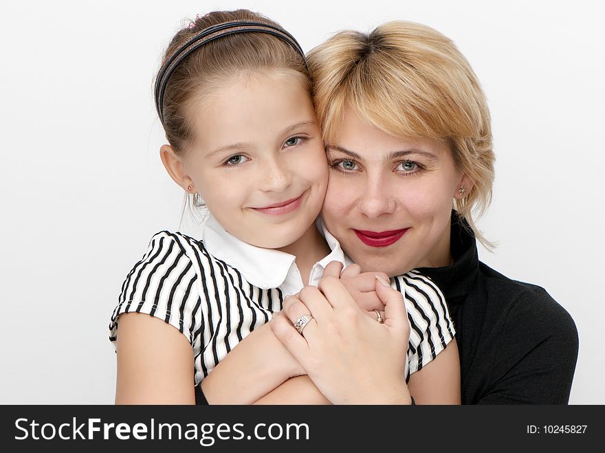 Portrait of mother with a daughter.