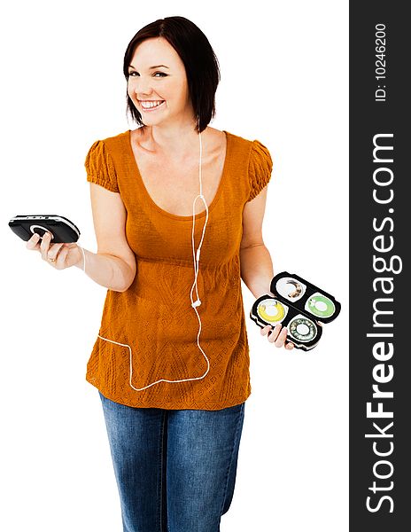Caucasian woman listening to music on an media player isolated over white. Caucasian woman listening to music on an media player isolated over white