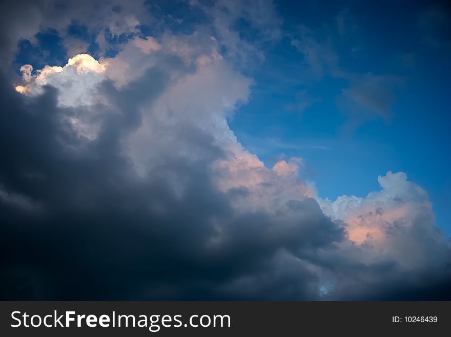 Clouds starting to build against a bright blue sky. Clouds starting to build against a bright blue sky.