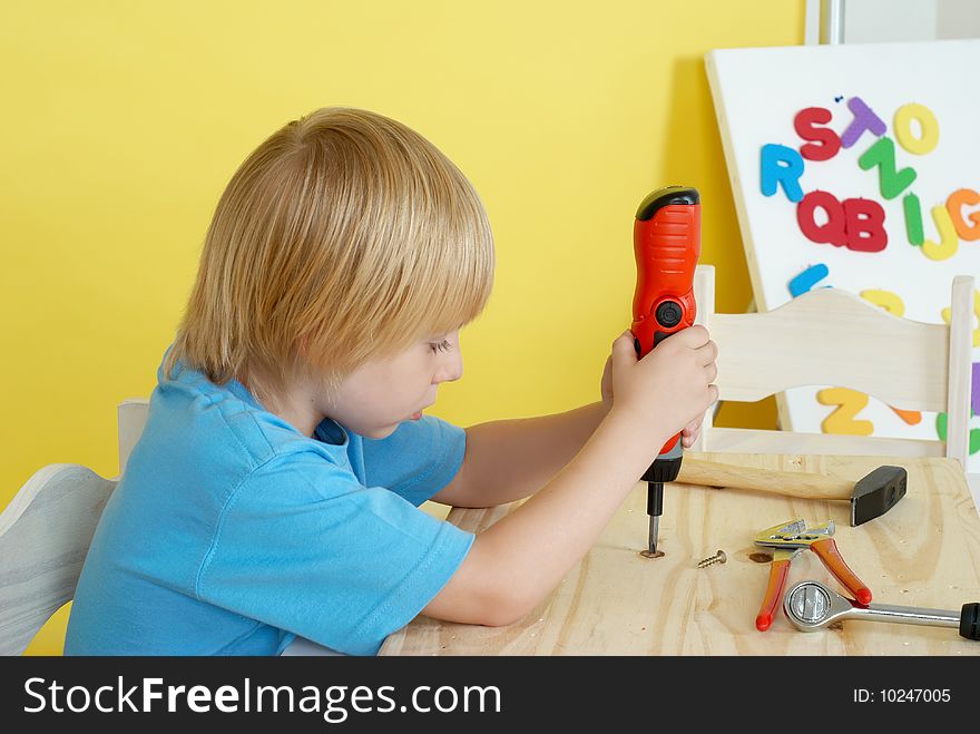 Little boy on creative lesson