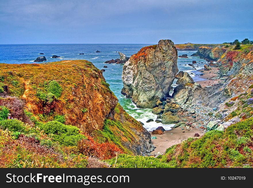 Beach and rocks with waves. Beach and rocks with waves