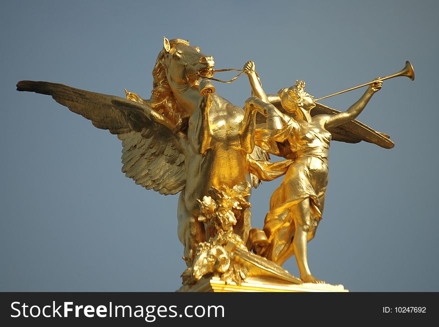 Statue on Alexander III bridge in Paris, France. Statue on Alexander III bridge in Paris, France
