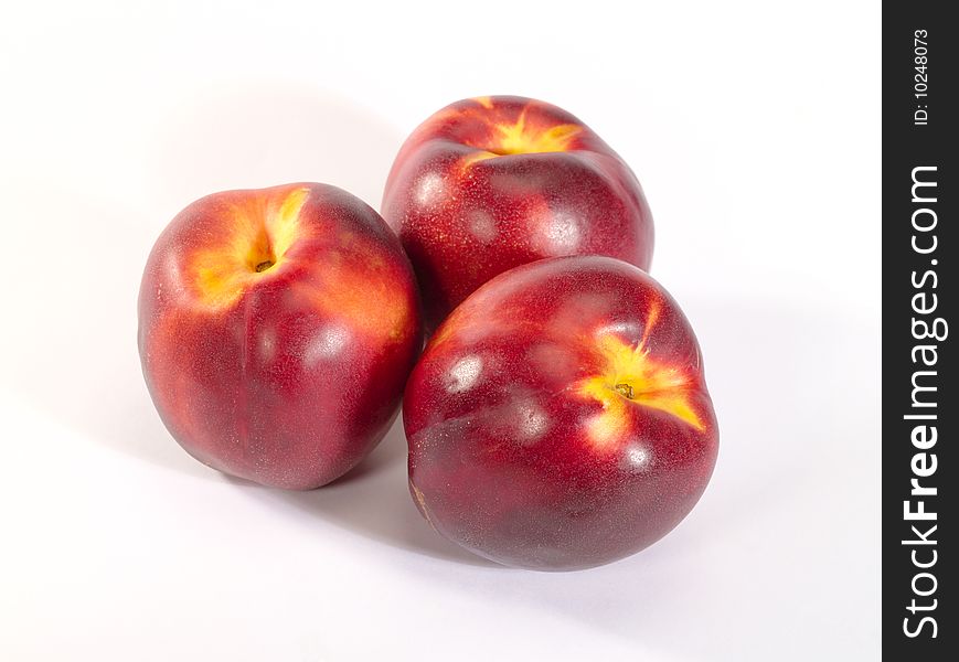 Fresh ripe peach with drop shadow.