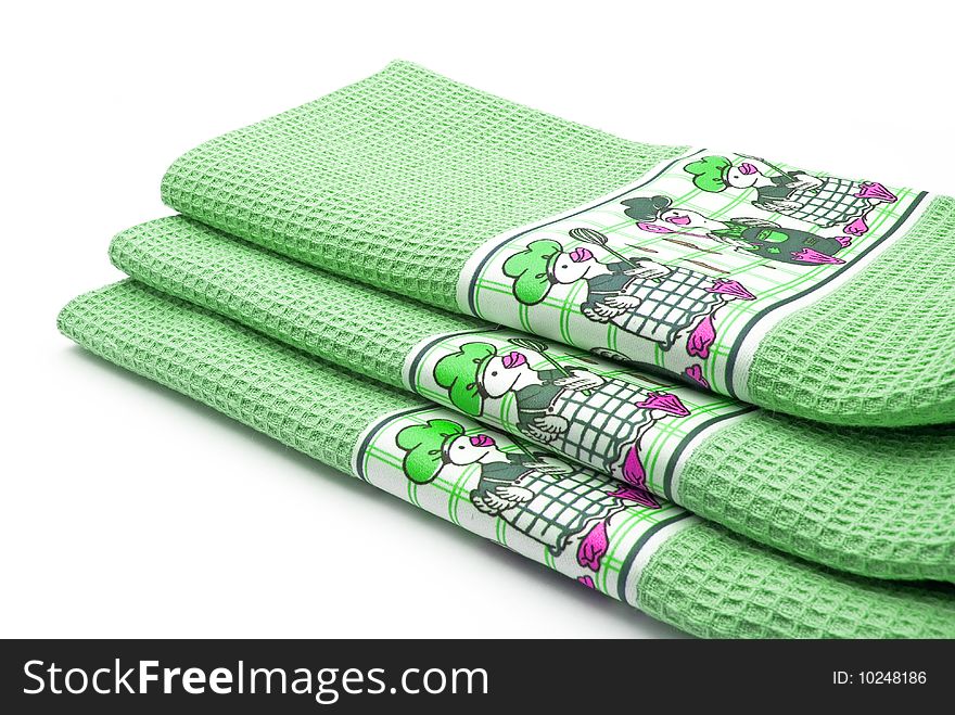 Stack of colorful cotton towels with patterns