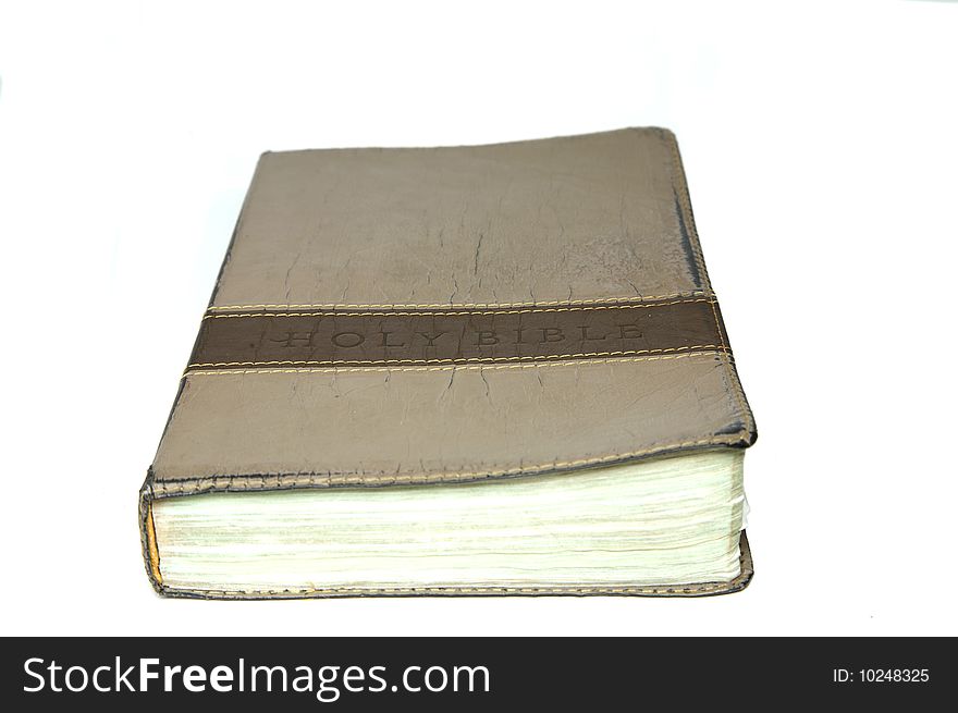 Old leather bible isolated over white. Old leather bible isolated over white