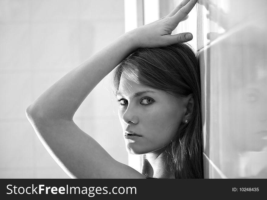 Portrait of young woman in bathroom. Portrait of young woman in bathroom