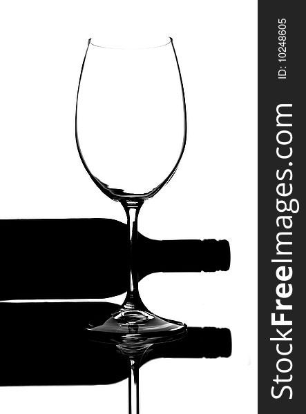 Silhouette isolation of wine glass and bottle. Silhouette isolation of wine glass and bottle