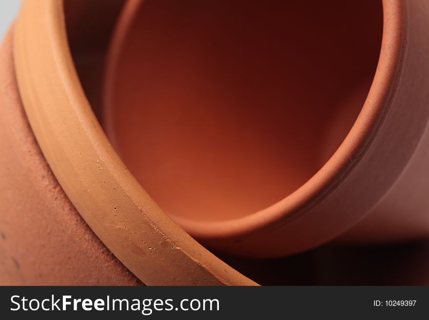 Terracotta pottery rounds pot close-up ceramic clay