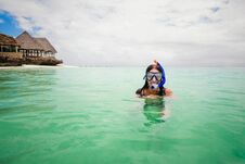 Happy Woman Wearing Mask For Snorkeling In The Turquoise Ocean Royalty Free Stock Image