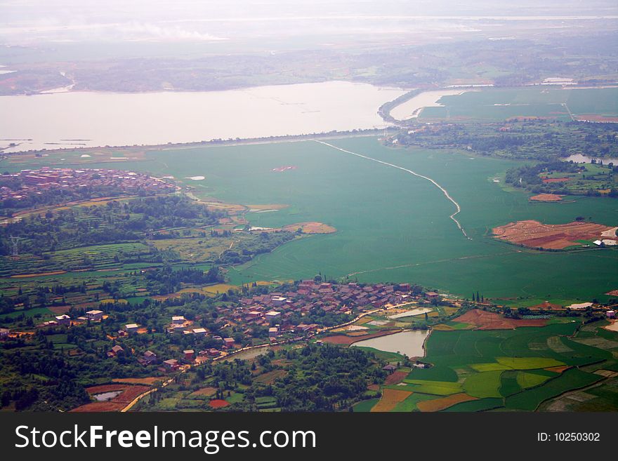 It is landscape looking in the plane. It is landscape looking in the plane