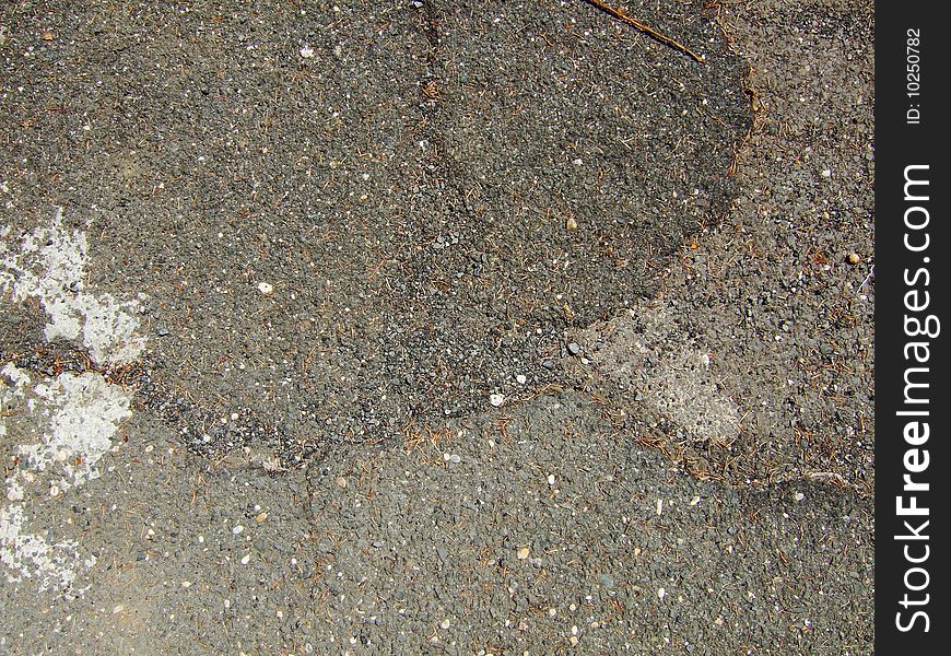 Asphalt details on a common road. Asphalt details on a common road