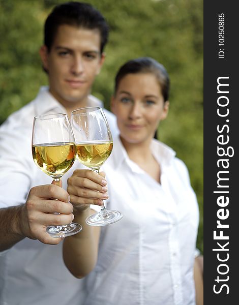Young couple with glas of wine outdoor