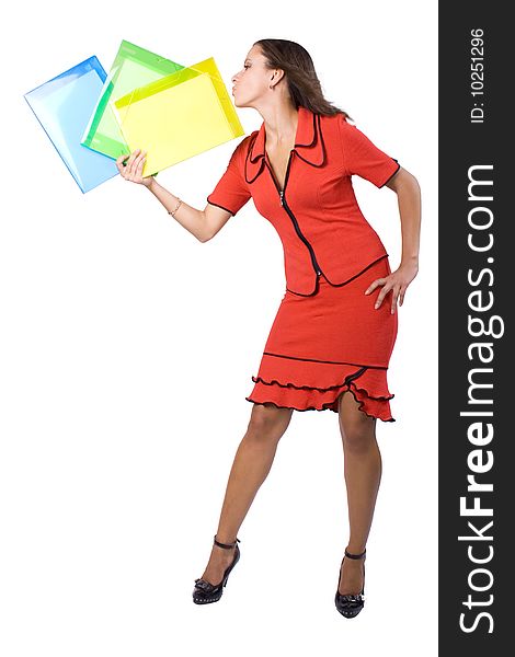 The young beautiful businesswoman at office behind work on a white background. The young beautiful businesswoman at office behind work on a white background