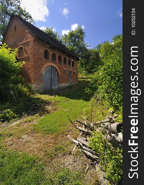 Old barn on a hill near the village