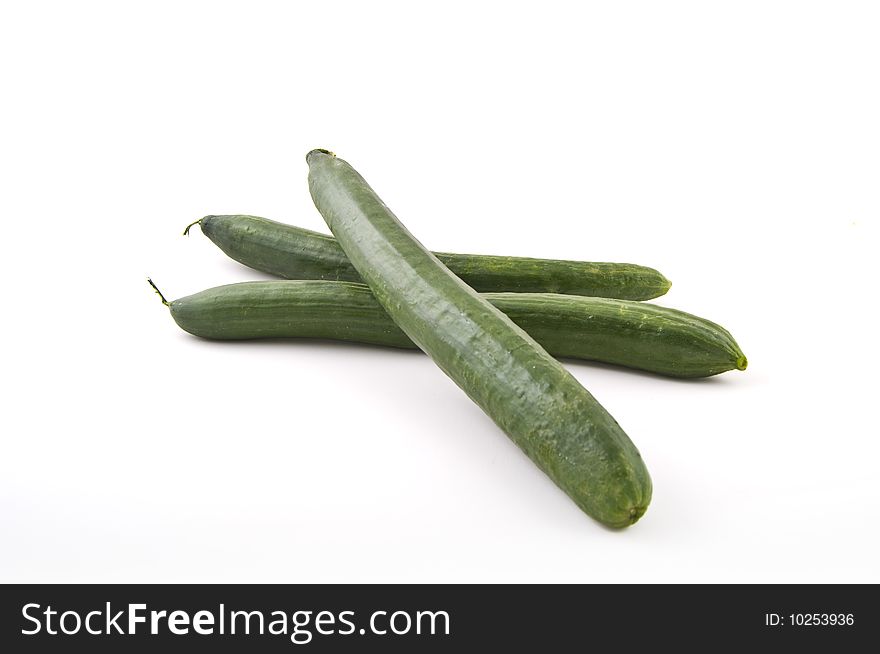 Three cucumbers isolated on white background