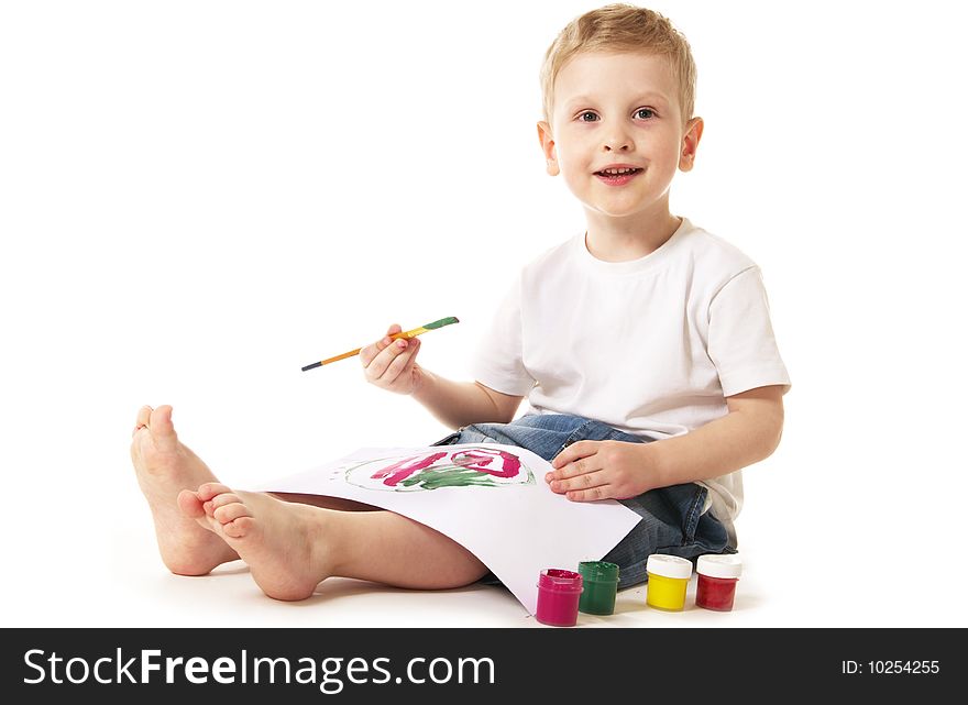 Little boy painting sitting on floor. Little boy painting sitting on floor