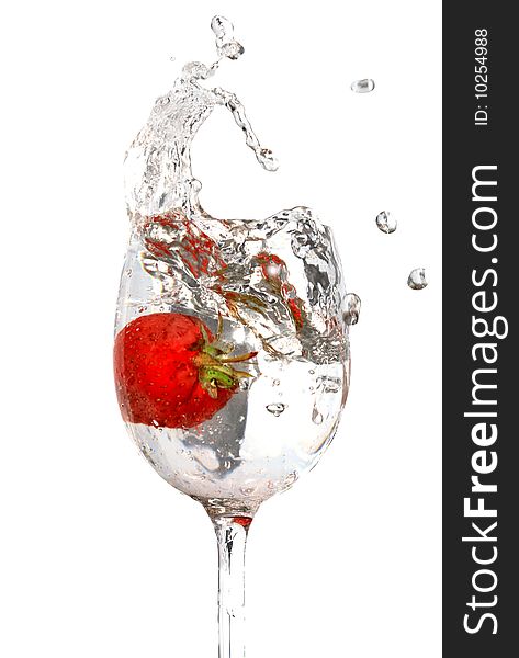 Strawberry inside goblet with splashing watery. Isolated with clipping path. Strawberry inside goblet with splashing watery. Isolated with clipping path