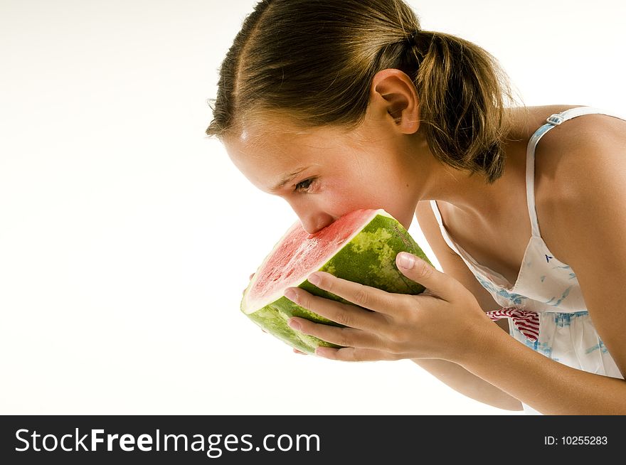 Young Girl Eating A Watermelon