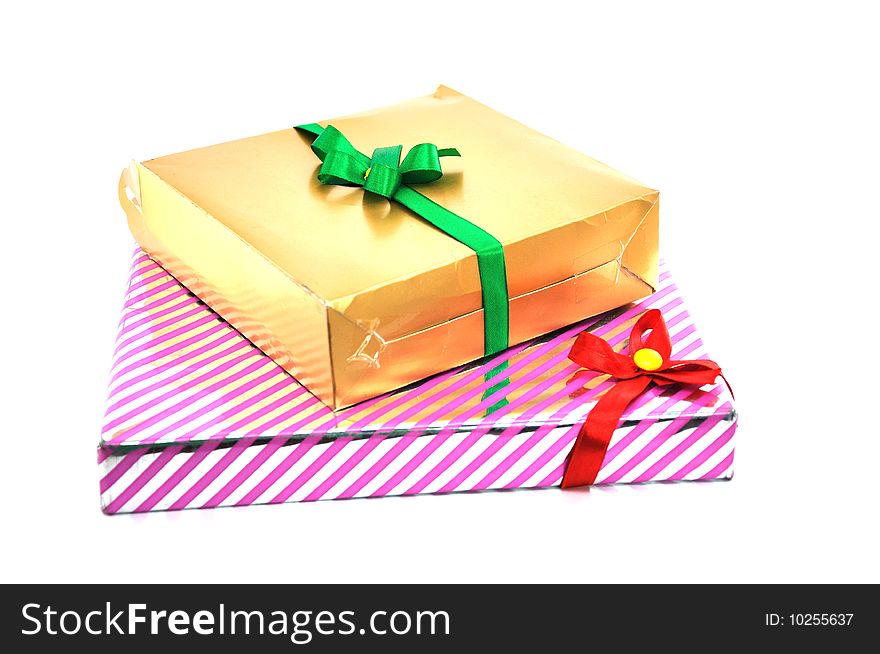 Decorated gift boxes with colorful bows.