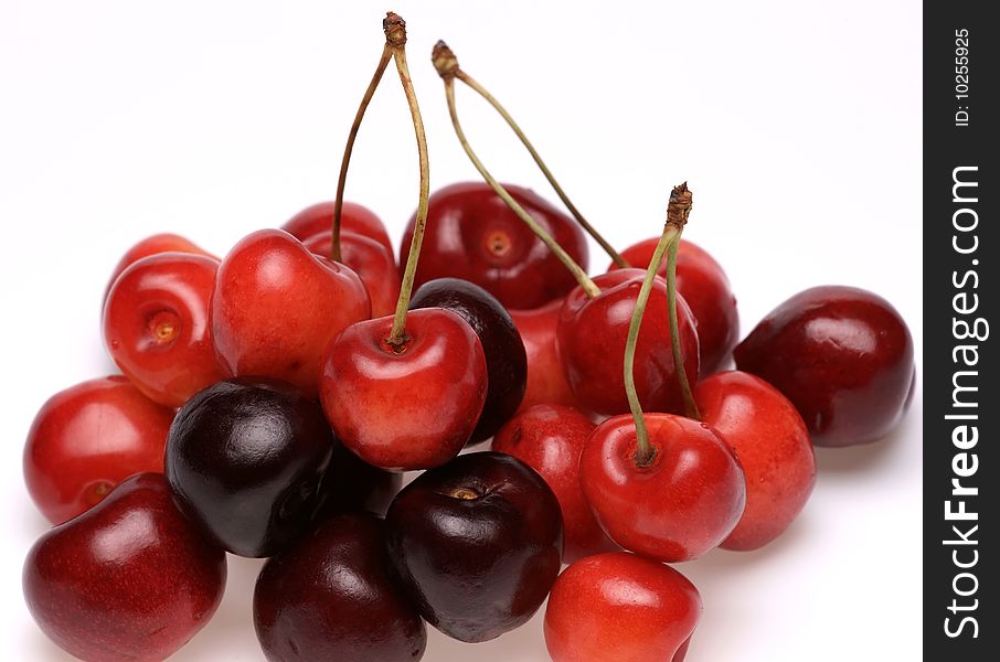 Red sweet cherry on a white background