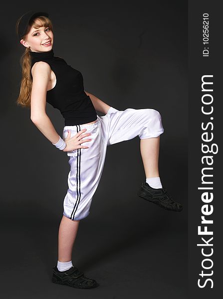 Smiling stretching beautiful teenage girl. Smiling stretching beautiful teenage girl