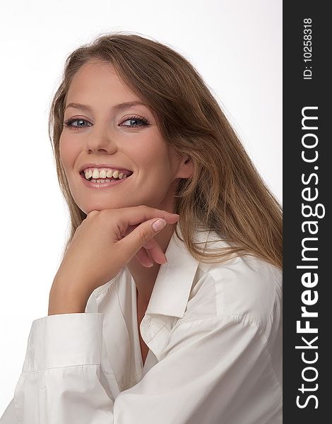 Portrait close up of the young European happy woman with blue eyes, on a white background. Portrait close up of the young European happy woman with blue eyes, on a white background