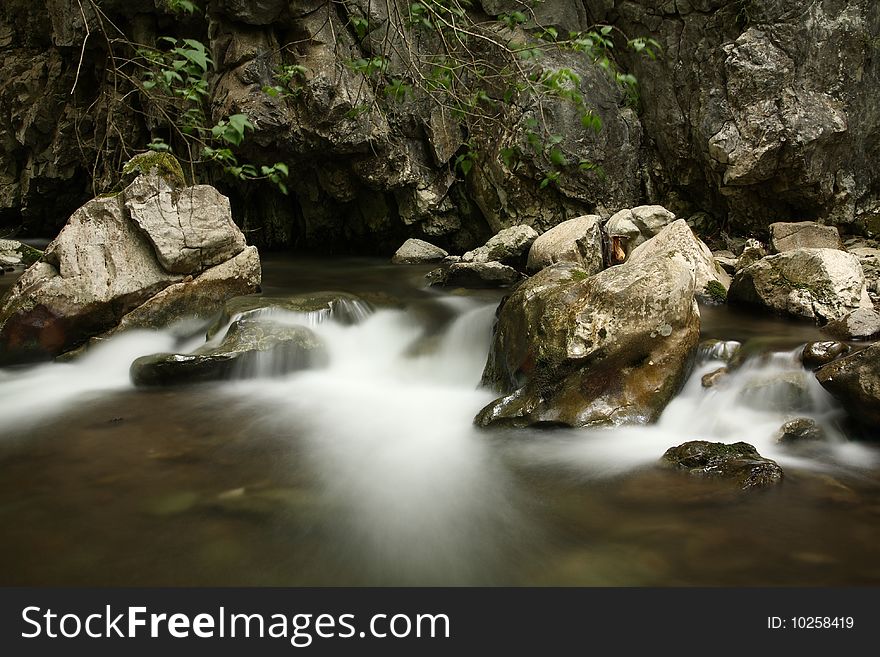 River in the forest, slow shutter photo