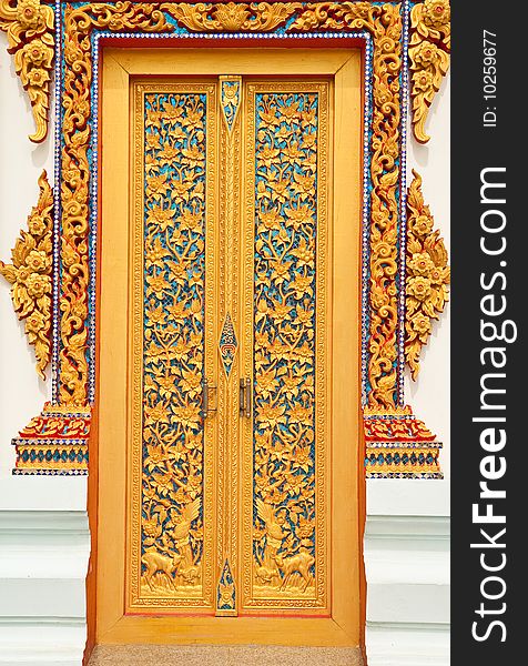 Buddhist church door in Thai style art. Buddhist church door in Thai style art