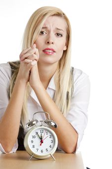 Businesswoman With An Alarm Clock Stock Images Businesswoman With An Alarm Clock Stock Images