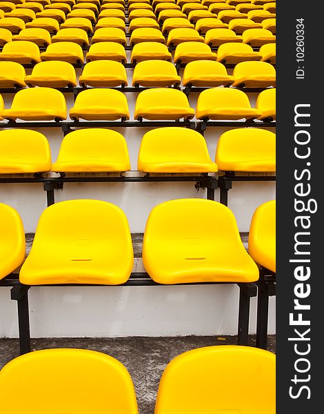 Yellow seats in stadium in Thailand. Yellow seats in stadium in Thailand