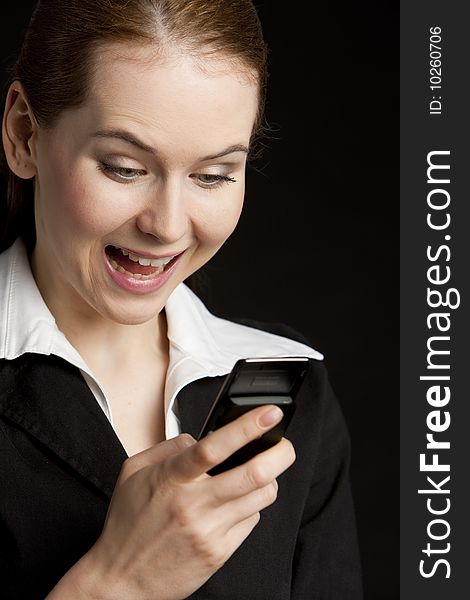 Portrait of businesswoman with mobile