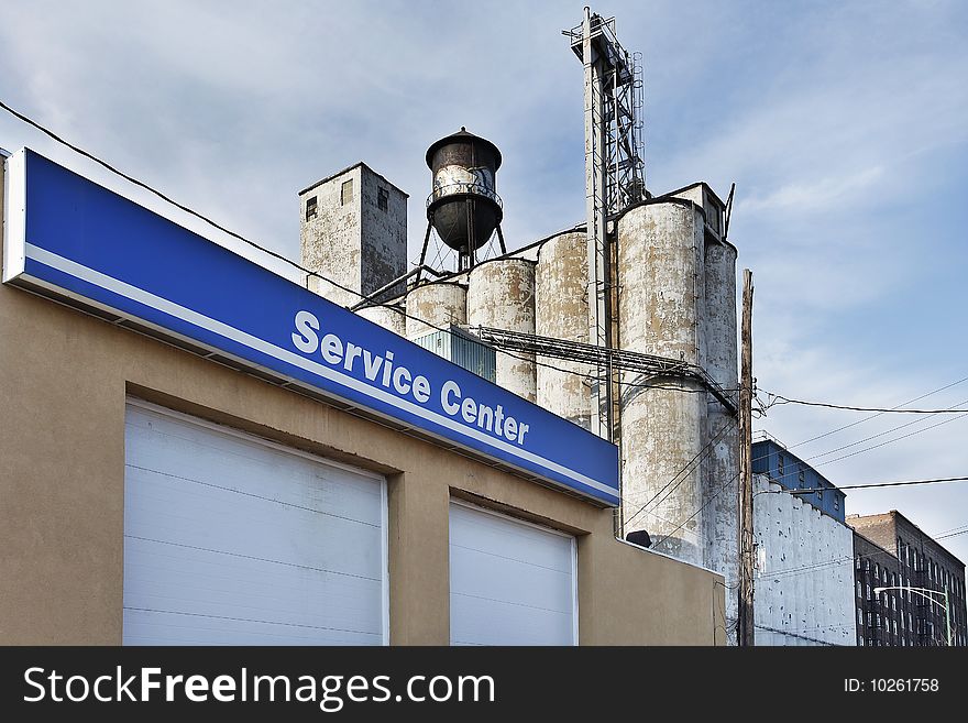 Factory area near downtown with service center sign