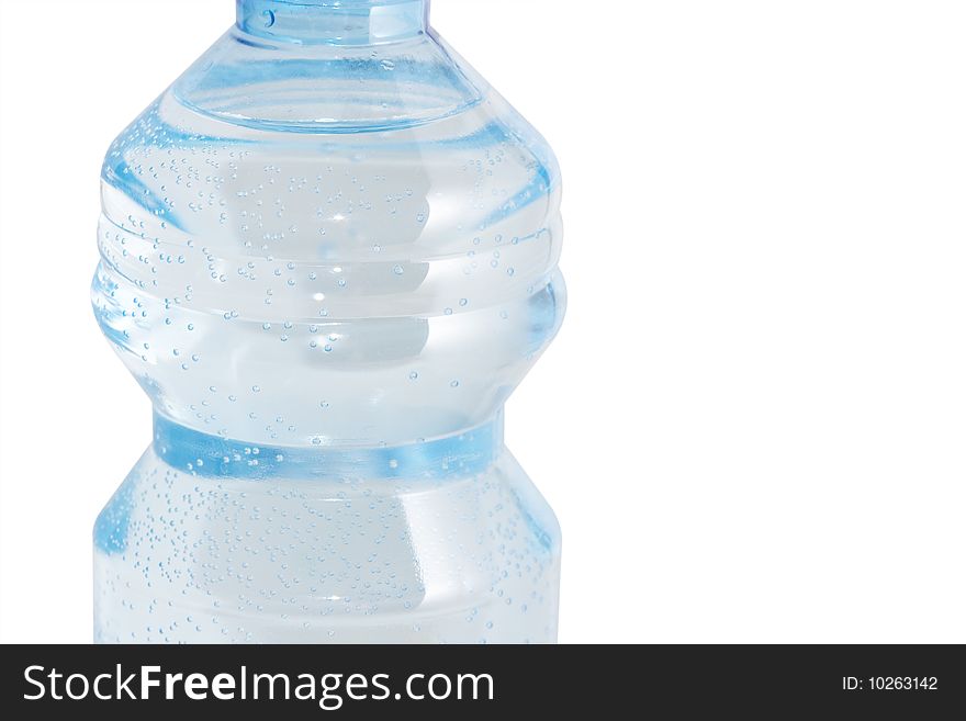 A close up on a blue water bottle isolated on a white background. A close up on a blue water bottle isolated on a white background.